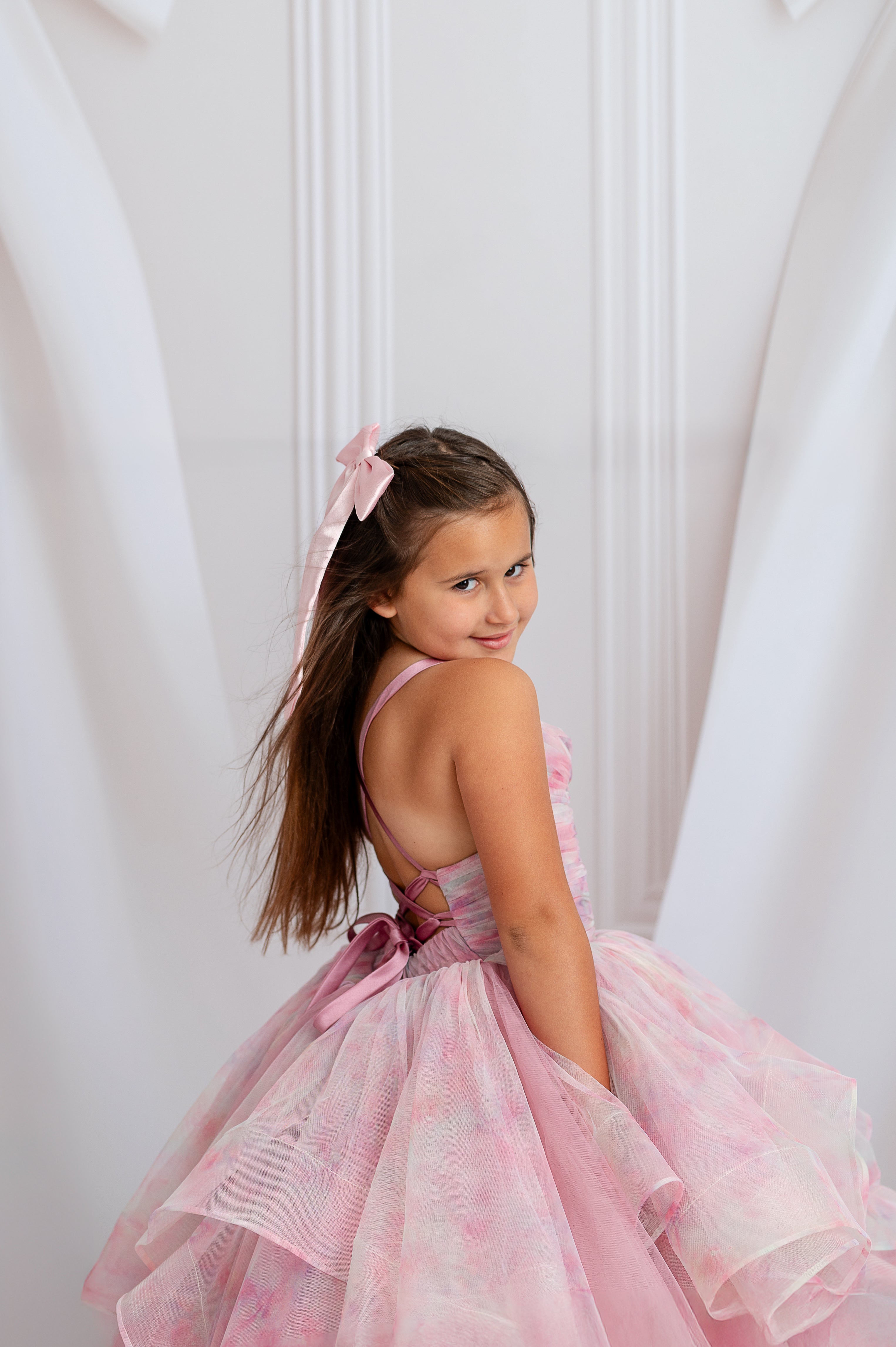 "Close-up of detachable tulle sleeves on the Pastel Clouds Dress, offering styling flexibility"

