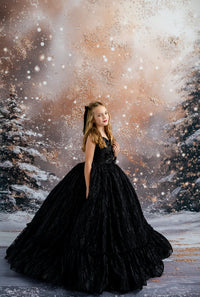 "A dreamy layered tulle skirt that flows beautifully with every twirl."

