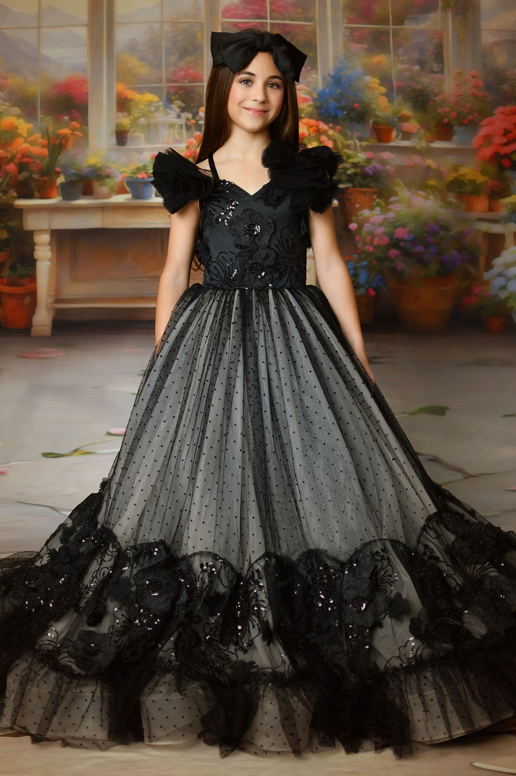 Child posing in an elegant couture dress during a guided Dream Gown Session in North Texas.