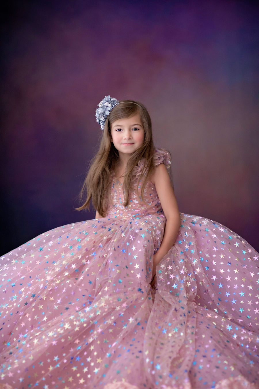 Star Confetti couture dress styled for a birthday photo shoot

