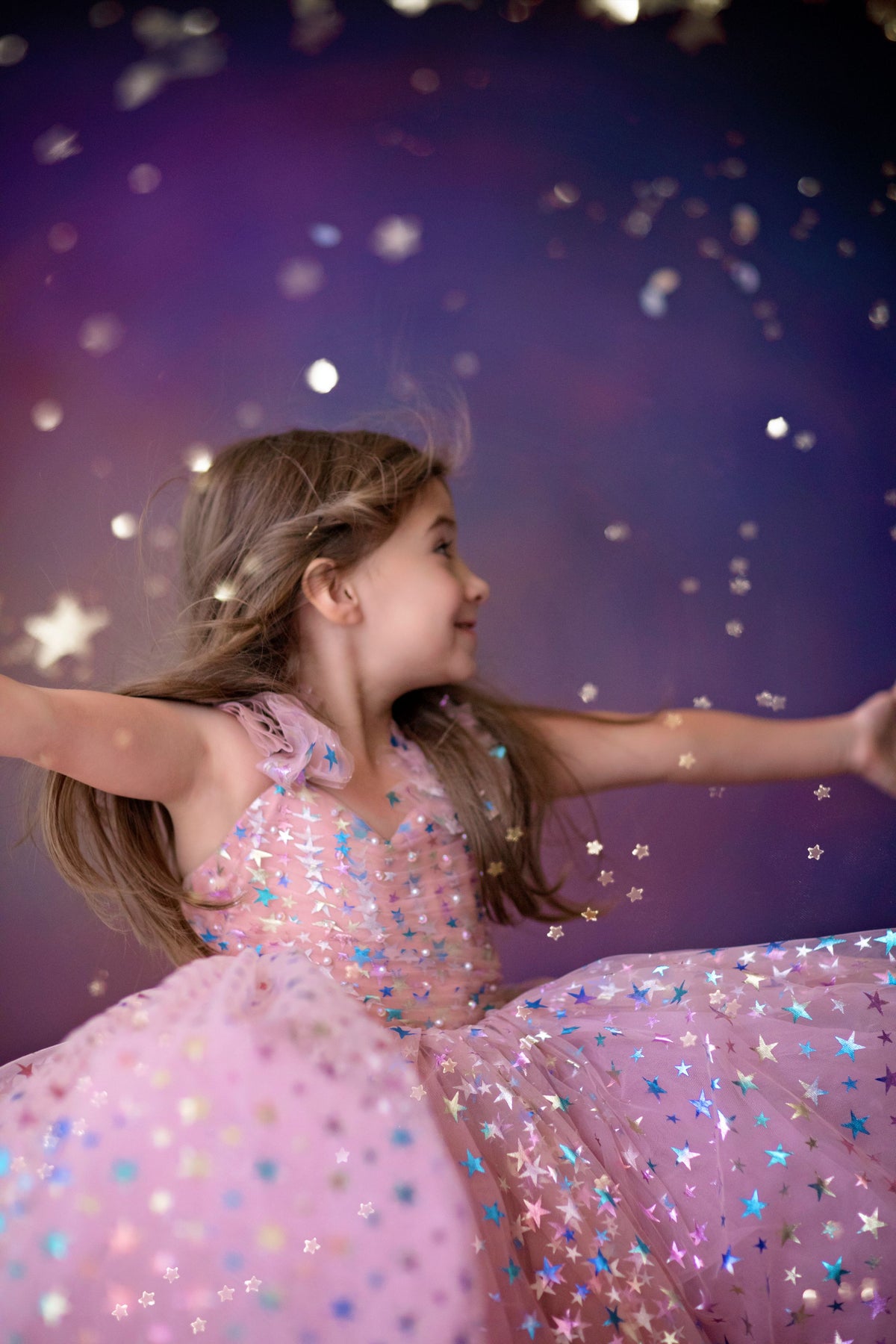 Star Confetti gown styled with floral headpiece for a whimsical session


