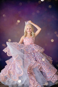 Girl in floor-length Confetti gown posing for flower girl photo shoot

