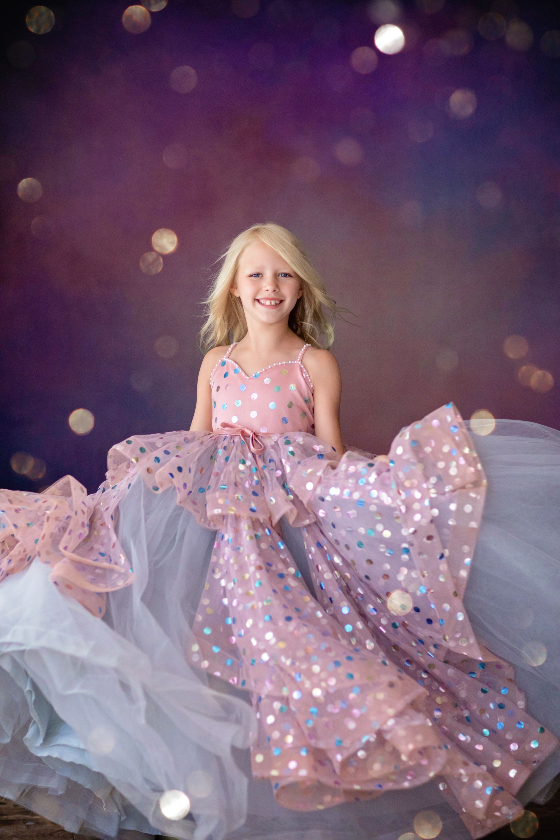 Full-length shot of custom Confetti gown in soft pink

