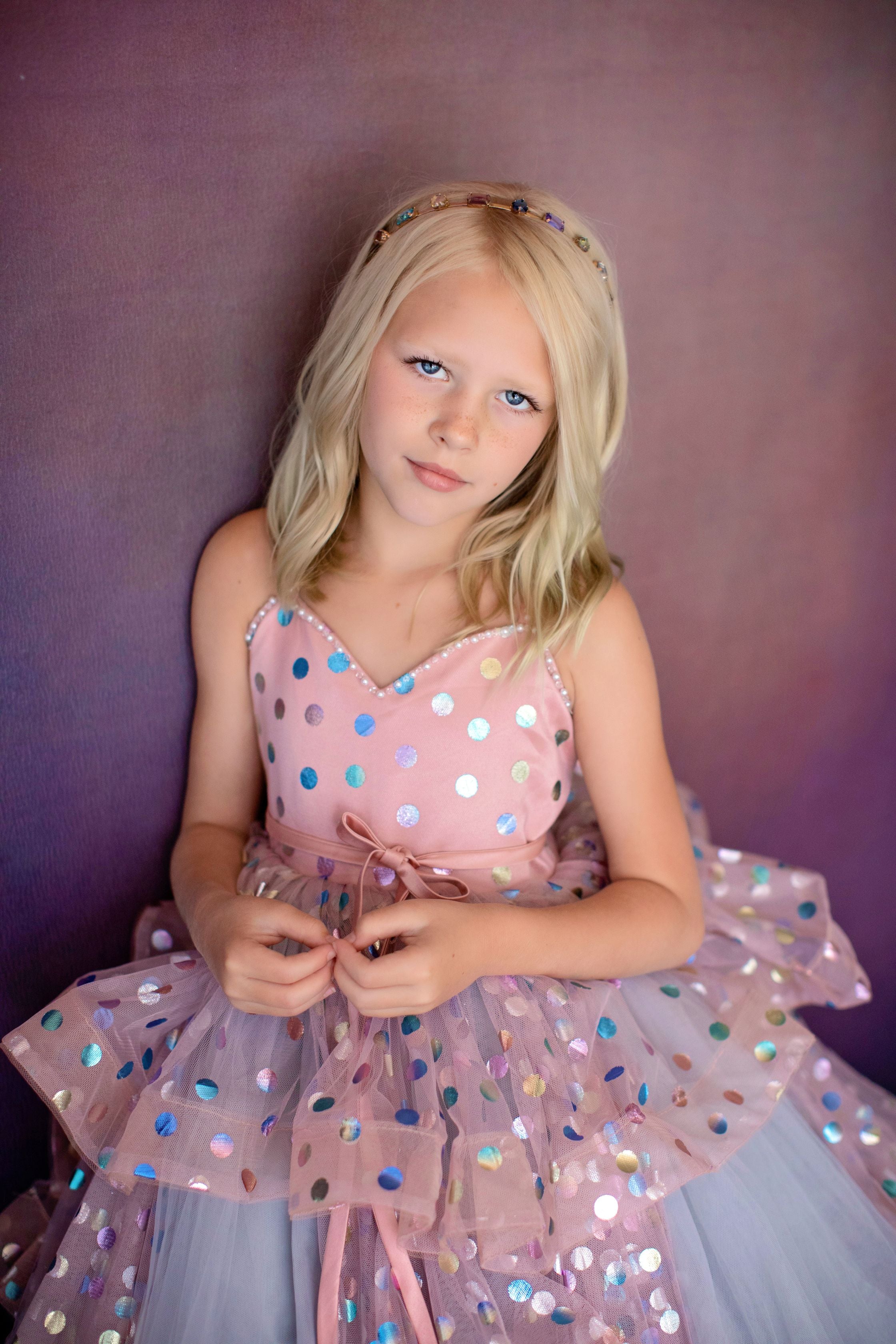 Flower girl wearing pastel Confetti gown outdoors

Close-up of layered horsehair tulle skirt on Confetti dress

