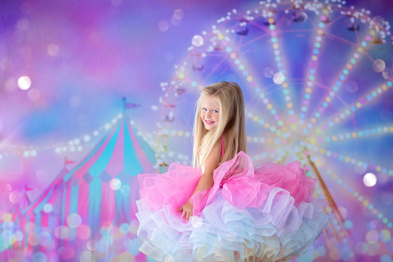 Birthday session featuring a child in the Golden Starlight gown outdoors

