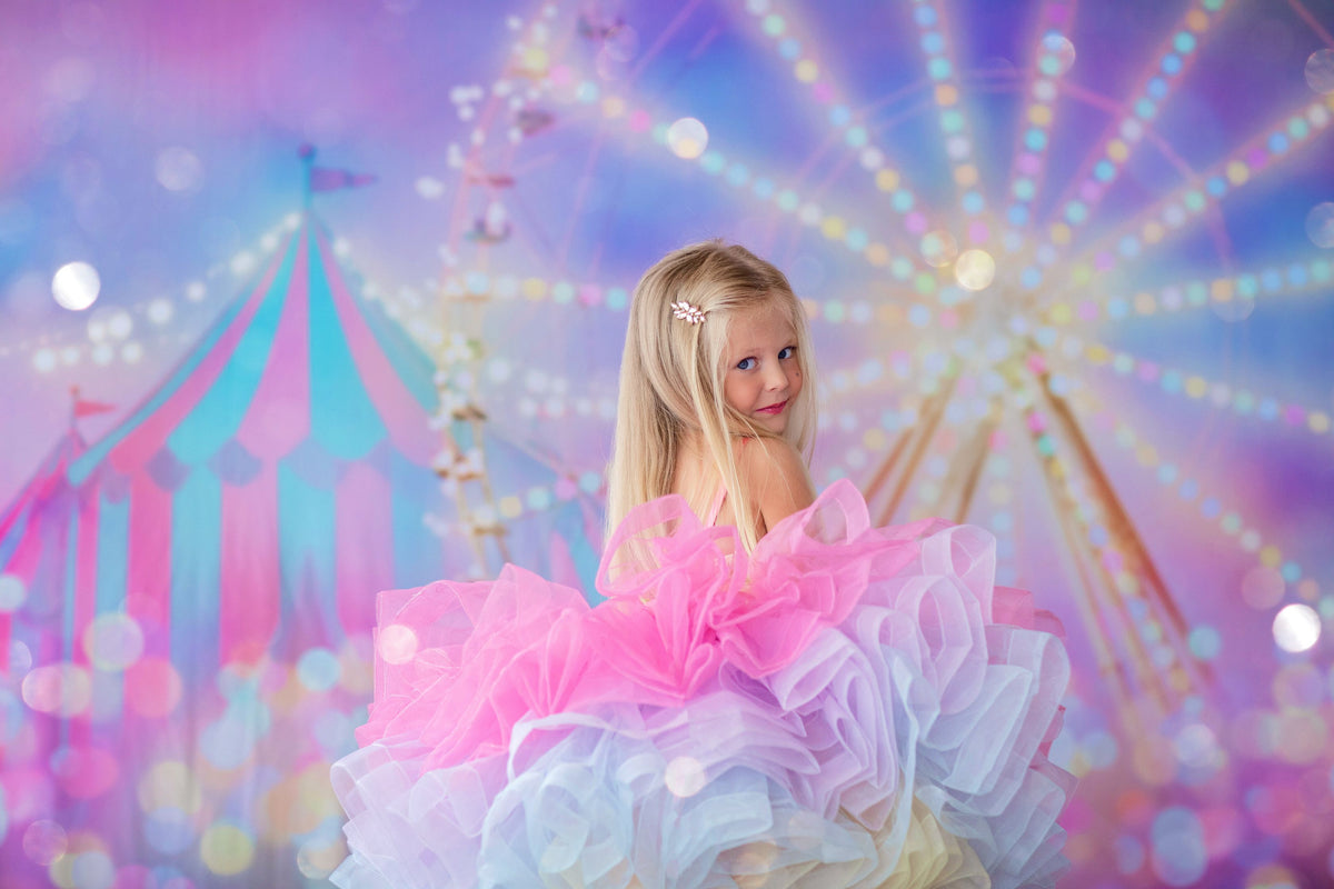Petite model posing in the Golden Starlight gown under soft natural light

