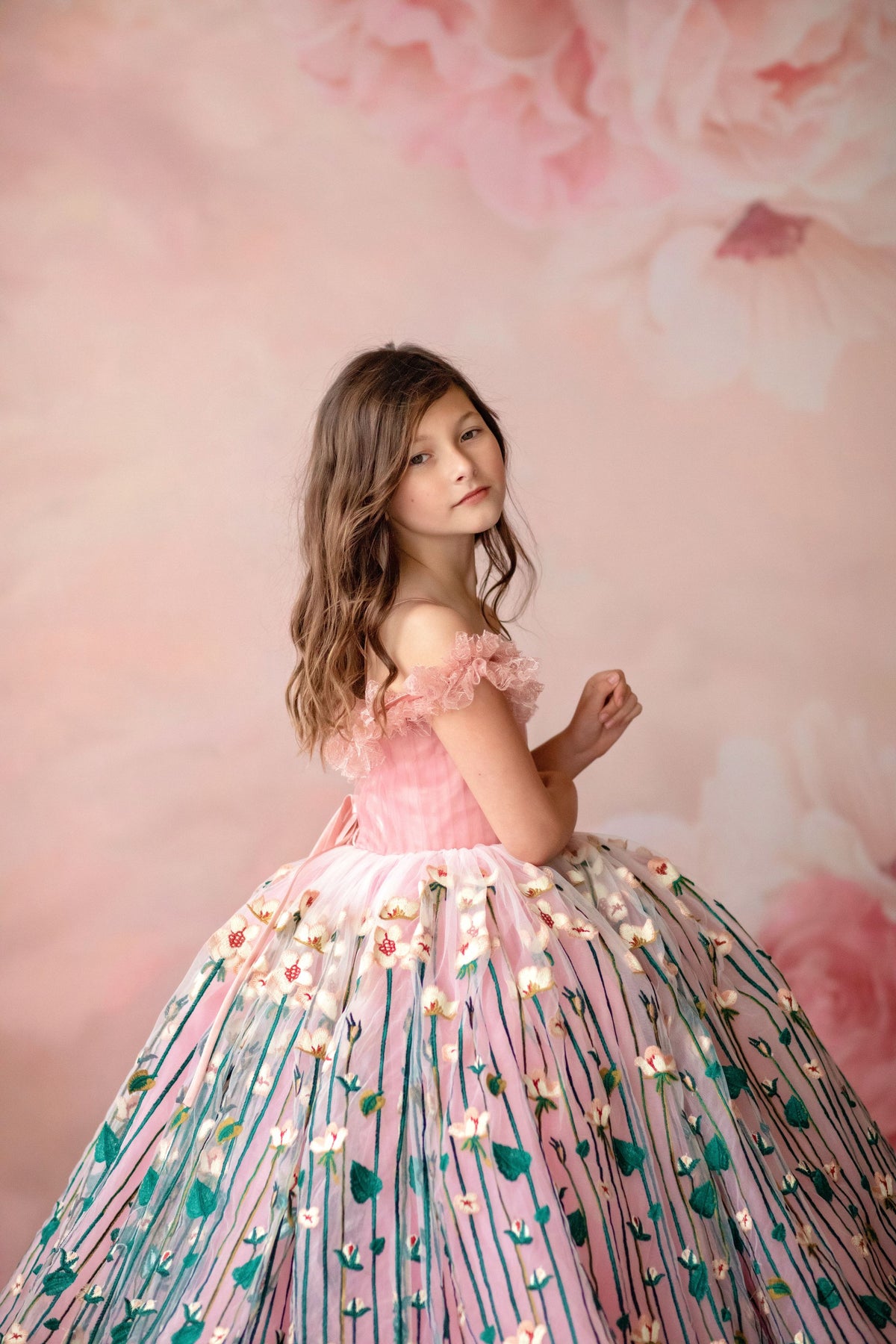 "Side view of soft pastel floral gown designed for twirling and comfort"

