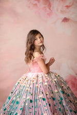 "Side view of soft pastel floral gown designed for twirling and comfort"

