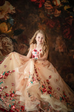 Elegant children’s gown with butterfly details perfect for weddings

