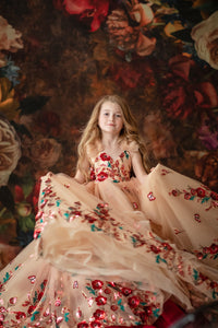 Elegant children’s gown with butterfly details perfect for weddings

