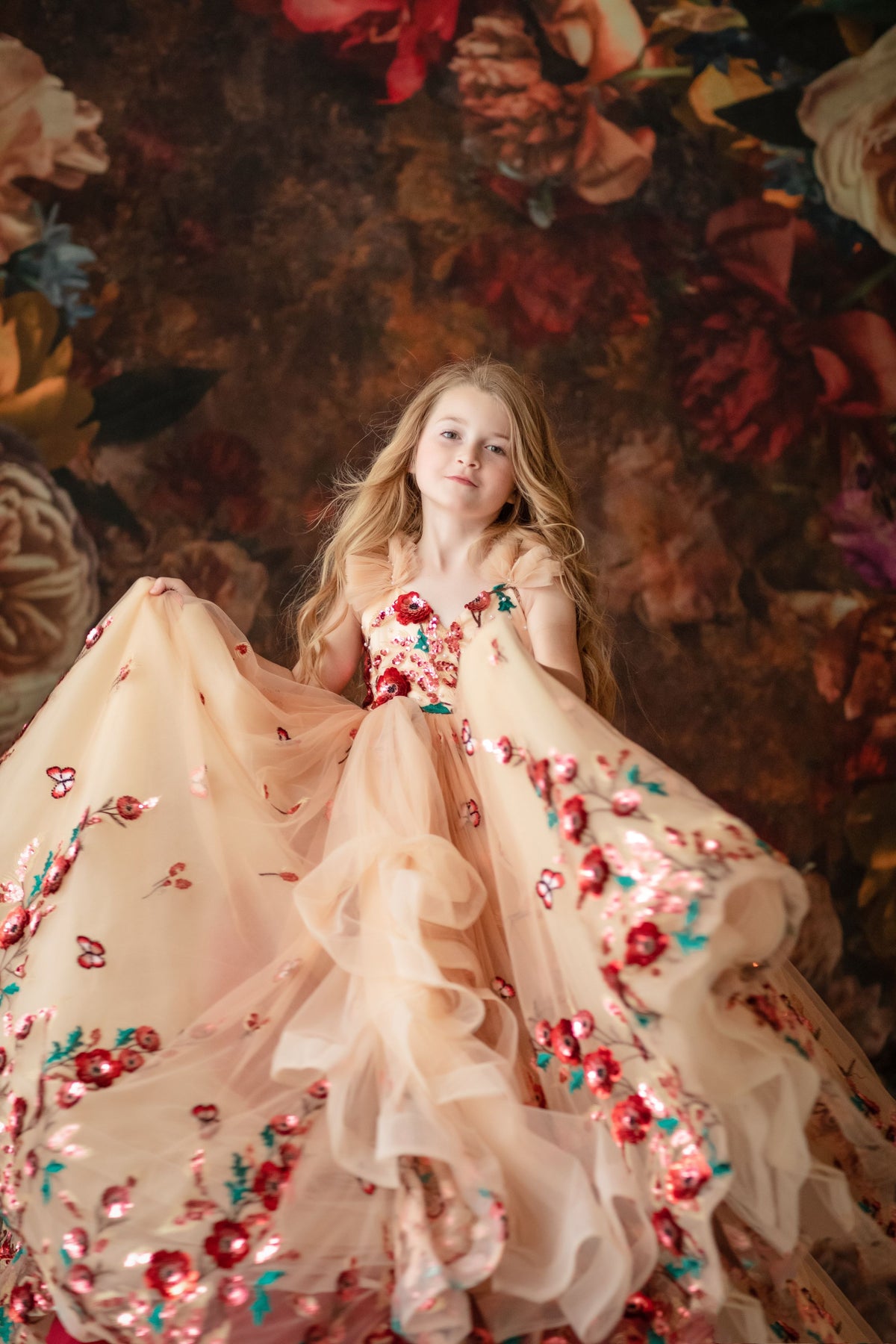 Flower girl dress with lace shoulder accents and full tulle skirt

