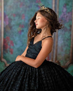 "Side view of custom couture gown for children with tulle skirt and detailed bodice"

