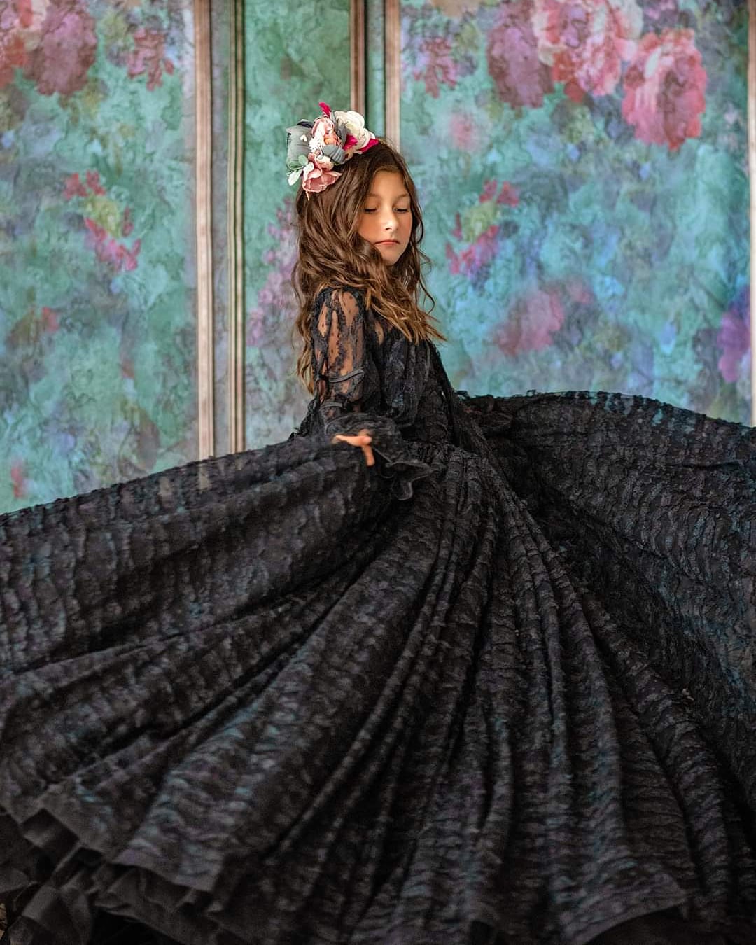 "Side view of custom couture gown for children with tulle skirt and detailed bodice"

