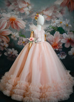 A floor-length pink floral dress with tulle and bead detailing, designed for special occasions.