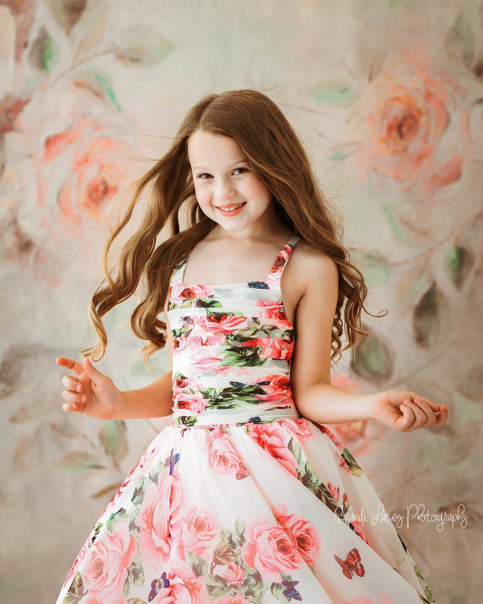 "Close-up of Ellie Butterfly Gown’s butterfly and floral chiffon fabric"
