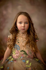 Child modeling Skylar gown with soft peach tulle skirt and horsehair braid trim

