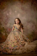 Child modeling Skylar gown with soft peach tulle skirt and horsehair braid trim

